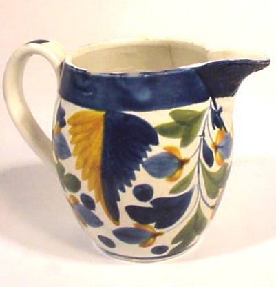 Antique soft paste decorated pitcher